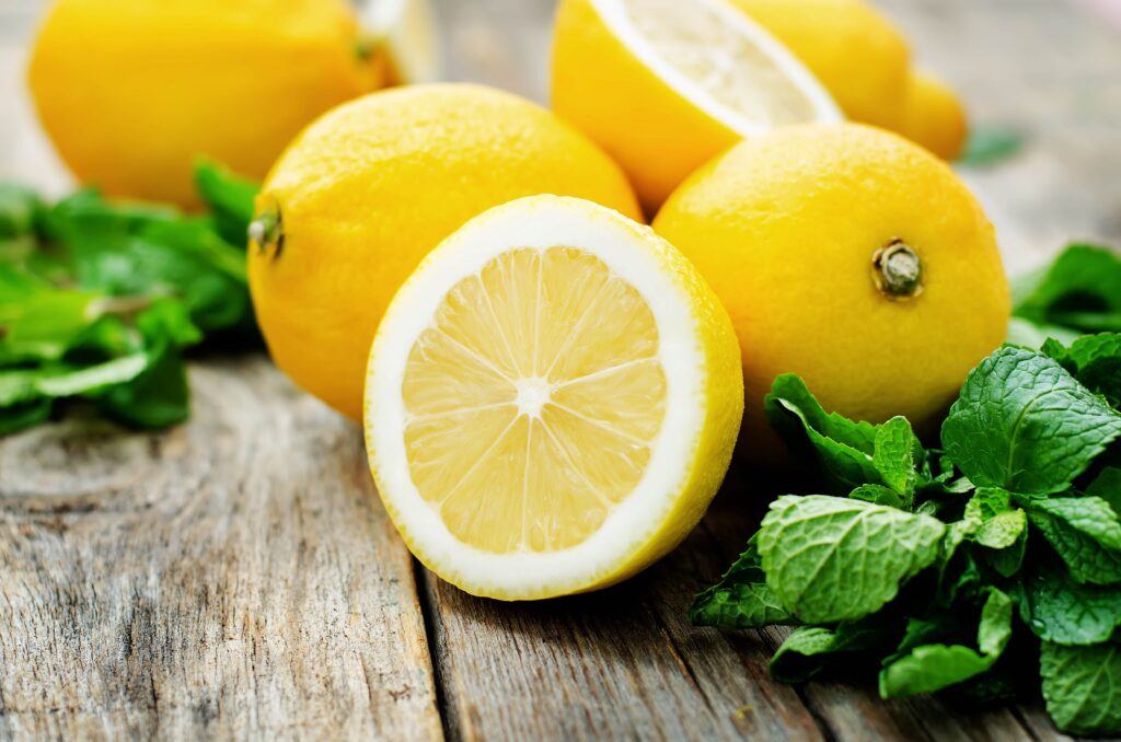 Lemons lying on rustic table